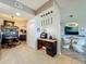 Entryway featuring a desk and an open view of the dining and living rooms at 6336 Buford St # 207, Orlando, FL 32835