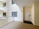Hallway entrance features a secure door and well-maintained exterior in a safe, modern building at 6336 Buford St # 207, Orlando, FL 32835