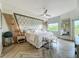 Bright and airy main bedroom with stylish decor and large windows for natural light at 6336 Buford St # 207, Orlando, FL 32835