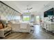 Bright and airy main bedroom with stylish decor and access to balcony at 6336 Buford St # 207, Orlando, FL 32835