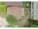 Overhead view of fenced backyard with shed and patio, plus the house roof at 6809 Magnolia Pointe Cir, Orlando, FL 32810