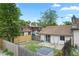 Aerial view of fenced backyard with small storage shed, grass and concrete patio area at 6809 Magnolia Pointe Cir, Orlando, FL 32810