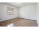 Large bedroom with wood floors, a window and bright lighting at 6809 Magnolia Pointe Cir, Orlando, FL 32810