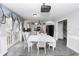 Bright dining area with table and chairs, adjacent to the kitchen, perfect for Gathering meals at 7642 Park Hill Ave, Leesburg, FL 34748