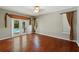 Bedroom with hardwood floors and access to the pool area at 9491 Wickham Way, Orlando, FL 32836