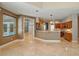 Kitchen open to the living area offers a breakfast bar and access to the pool through the window at 9491 Wickham Way, Orlando, FL 32836