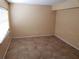 The vacant living room features neutral walls, light-colored tile flooring, and a window at 1000 S Semoran Blvd # 415, Winter Park, FL 32792