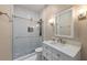 Modern bathroom with walk-in shower, white subway tile, and vanity at 1021 Piedmont Oaks Dr, Apopka, FL 32703