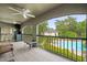 Relaxing balcony view of the pool with ceiling fans and comfortable seating at 1055 Kensington Park Dr # 203, Altamonte Springs, FL 32714