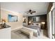Comfortable main bedroom suite with an attached bathroom featuring a neutral color palette at 1055 Kensington Park Dr # 203, Altamonte Springs, FL 32714