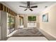 Bright main bedroom with balcony access and modern furnishings at 1055 Kensington Park Dr # 203, Altamonte Springs, FL 32714