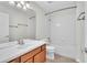 Full bathroom features a shower and tub combination with a tile surround at 1067 Chatham Break St, Orlando, FL 32828