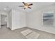 Bedroom featuring a window and door, perfect for relaxation and comfort at 1067 Chatham Break St, Orlando, FL 32828