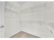 Walk-in closet featuring multiple shelves for optimal storage and organization at 1067 Chatham Break St, Orlando, FL 32828