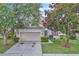 Charming two-story home featuring a spacious two-car garage and well-maintained landscaping at 1067 Chatham Break St, Orlando, FL 32828