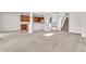 Open-concept living area with kitchen, staircase, and ample space for entertaining at 1067 Chatham Break St, Orlando, FL 32828