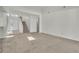 Open-concept living room features a staircase, tiled foyer, and spacious area at 1067 Chatham Break St, Orlando, FL 32828