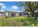 Fully fenced backyard with mature trees and a screened-in pool at 111 Woodstream Ct Ct, Maitland, FL 32751
