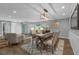 Open concept dining area with wood floors, modern decor, and natural light at 111 Woodstream Ct Ct, Maitland, FL 32751
