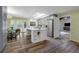 Open kitchen with a large island, modern appliances, and a view of the pool at 111 Woodstream Ct Ct, Maitland, FL 32751