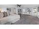 Spacious main bedroom features a ceiling fan, walk-in closet, and neutral decor at 111 Woodstream Ct Ct, Maitland, FL 32751