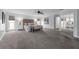 Spacious main bedroom with neutral tones, features a seating area, large windows, and a mirrored closet at 111 Woodstream Ct Ct, Maitland, FL 32751