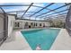 Relaxing screened-in pool with outdoor cooking area is perfect for entertaining at 111 Woodstream Ct Ct, Maitland, FL 32751