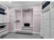 Custom walk-in closet with drawers, shelves, and clothing racks for optimal storage at 111 Woodstream Ct Ct, Maitland, FL 32751