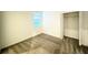 Bright bedroom with a closet, neutral carpet and a window providing natural light at 1147 Pomelo St, Davenport, FL 33837