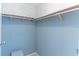 Walk-in closet featuring built-in shelving and ample storage space for organization at 116 E Plantation Blvd, Lake Mary, FL 32746