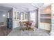 Cozy dining room with built-in storage and adjacent living area at 116 E Plantation Blvd, Lake Mary, FL 32746