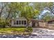Charming single-story home with a covered carport and well-maintained front yard at 116 E Plantation Blvd, Lake Mary, FL 32746