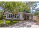 Charming single-story home with a covered carport and well-maintained front yard at 116 E Plantation Blvd, Lake Mary, FL 32746