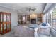 Open living area with fireplace, built-ins, and seamless flow to dining space at 116 E Plantation Blvd, Lake Mary, FL 32746
