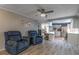 Open living room features modern flooring and is open to the eat-in kitchen at 116 E Plantation Blvd, Lake Mary, FL 32746