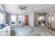 Spacious living room featuring a display cabinet with views into dining area at 116 E Plantation Blvd, Lake Mary, FL 32746