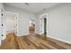 The bedroom offers wood flooring with an attached bathroom and walk-in closet at 1235 Arapaho Trl, Geneva, FL 32732
