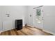 Spacious mud room with wood flooring and access to the backyard at 1235 Arapaho Trl, Geneva, FL 32732