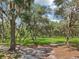 Beautiful homesite with mature trees offering shade and privacy at 1235 Arapaho Trl, Geneva, FL 32732