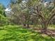 Beautiful homesite with mature trees offering shade and privacy at 1235 Arapaho Trl, Geneva, FL 32732