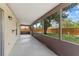 Large screened porch with peaceful backyard views, providing ample outdoor living space at 1353 Ortega St, Winter Springs, FL 32708