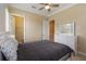 Comfortable bedroom offering ample closet space and a white dresser at 13755 Benavente Ave, Orlando, FL 32827
