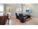 Cozy living area with comfortable seating, a ceiling fan, and great natural light at 13755 Benavente Ave, Orlando, FL 32827