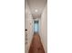 Hallway with carpet flooring, neutral walls, and recessed lighting at 1471 Mirabella Cir, Davenport, FL 33897