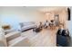 Spacious living room featuring an open floor plan with modern furnishings and lots of natural light at 1471 Mirabella Cir, Davenport, FL 33897