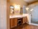 Main bathroom featuring double sinks with a vanity and a glass enclosed shower at 14831 Yorkshire Run Dr, Orlando, FL 32828