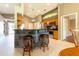 Stylish kitchen featuring a tile bar, stainless steel appliances, and pendant lighting at 14831 Yorkshire Run Dr, Orlando, FL 32828