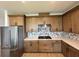 Well-equipped kitchen with stainless steel appliances, a gas range, and a decorative backsplash at 1646 Pinecliff Dr, Apopka, FL 32703