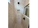 Modern shower with black hardware, herringbone tile, and built-in niche at 1646 Pinecliff Dr, Apopka, FL 32703