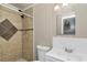 This bathroom features a tiled stand up shower with new fixtures and a vanity sink at 1753 Nw 44Th St, Ocala, FL 34475